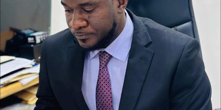 Justice Minister Oswald Tweh working at his office amid clarification that he did not boycott former Chief Justice Yuoh’s retirement ceremony in Monrovia