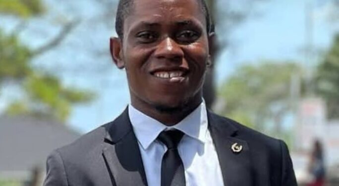Blamo N. Toe, LEGISPOOL presidential aspirant, pictured in a black suit and tie, smiling during the launch of his ELEVATE platform for press reform.