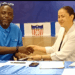 Borough FC President Sylvanus Morris with Liberia Football Association partner during Bettomax Champions Cup launch in Monrovia.