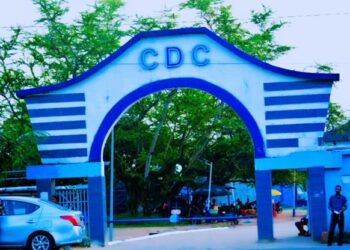 Main entrance arch of the Congress for Democratic Change (CDC) headquarters in Monrovia, Liberia, at the center of a court-ordered eviction dispute