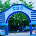Main entrance arch of the Congress for Democratic Change (CDC) headquarters in Monrovia, Liberia, at the center of a court-ordered eviction dispute