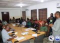 Civil Service Agency Director-General Dr. Josiah Joekai and Internal Affairs Minister Francis Nyumalin lead the launch of Liberia’s nationwide civil service payroll audit in Monrovia.