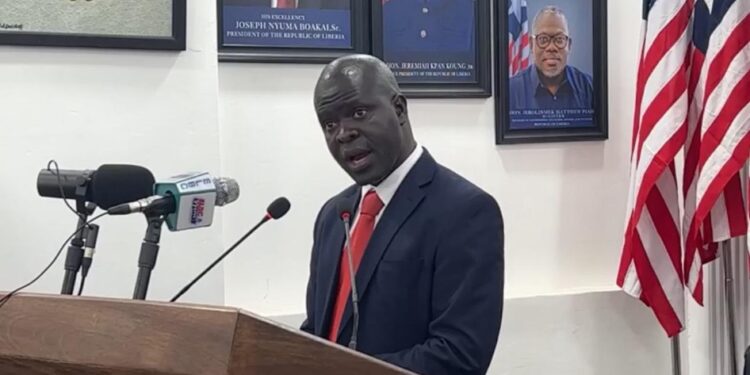 EPA Executive Director Dr. Emmanuel Urey Yarkpawolo speaks at the Ministry of Information about Liberia’s draft carbon trading policy.