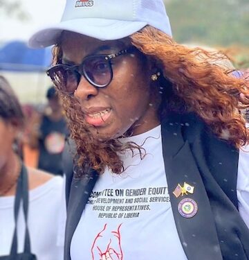 Rep. Ellen Attoh-Wreh wearing anti-drug campaign attire during awareness event in Liberia