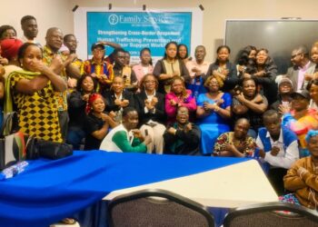 Participants pose at a human trafficking workshop in Monrovia, hosted by Family Service Liberia and the Bliss Foundation, advocating for a national Anti-Trafficking Day on January 11.