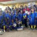 Children in jerseys at the launch of Believers Eastern Church Football Academy in Monrovia, blending sports and education.