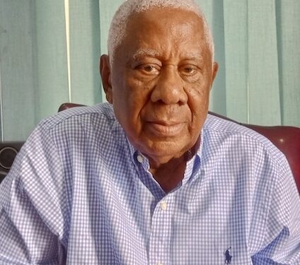Former Liberian Finance Minister David M. Farhart seated in his Monrovia office during interview on Roye Building renovation