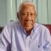 Former Liberian Finance Minister David M. Farhart seated in his Monrovia office during interview on Roye Building renovation