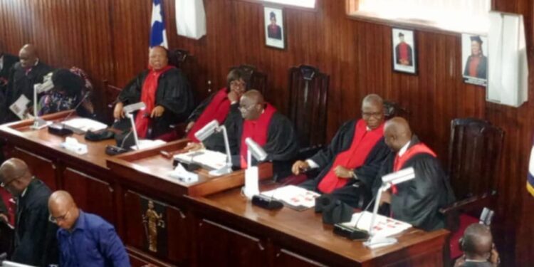 Liberian Supreme Court justices in session as Chief Justice Yamie Quiqui Gbeisay pledges judiciary reforms and performance-based leadership