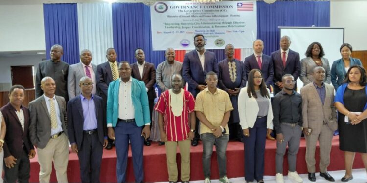 Group photo of Governance Commission, government officials, and partners at Monrovia policy dialogue on sustainable urban governance reform