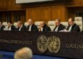 ICJ judges seated at the International Court of Justice in The Hague during the July 2025 climate advisory opinion hearing.