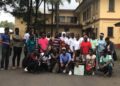 Group of young Liberian writers and literature students gathered outside the University of Liberia campus