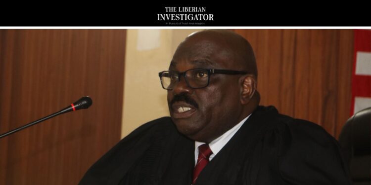 Judge Roosevelt Z. Willie presides in court amid growing calls for his recusal from the Capitol arson case in Liberia
