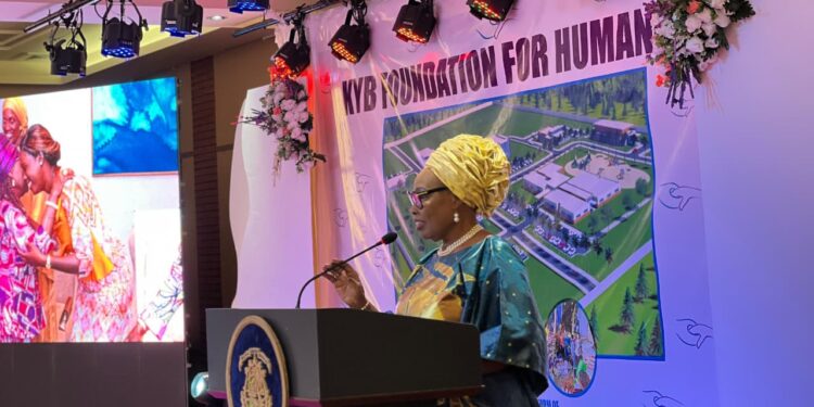 First lady Kartumu Boakai speaking into the microphone