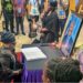 First Lady Kartumu Boakai signs the condolence book for the late Minister Sylvester Grigsby at the Executive Mansion in Monrovia