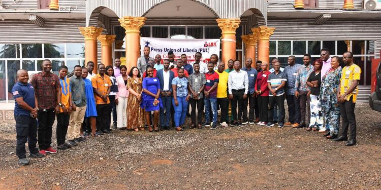 Group photo of journalists and officials from the Press Union of Liberia and Liberia Revenue Authority during a two-day tax reporting training in Kakata, Margibi County.