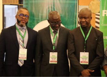 Clarence Massaquoi and West African telecom leaders pose at ECOWAS Free Roaming launch in Monrovia, highlighting regional mobile cost reforms for Liberian travelers.