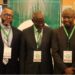 Clarence Massaquoi and West African telecom leaders pose at ECOWAS Free Roaming launch in Monrovia, highlighting regional mobile cost reforms for Liberian travelers.