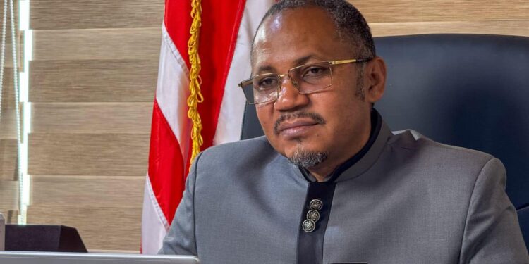 Liberian lawmaker Nehker Gaye speaking during a House of Representatives meeting with diplomats in Monrovia.