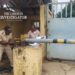 Court officers padlocking NEC premises during enforcement of a Commercial Court ruling in Monrovia.