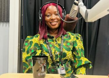 ActionAid Liberia Program Coordinator Norwu Harris speaks on climate justice during a radio interview ahead of a grassroots dialogue in Bong County