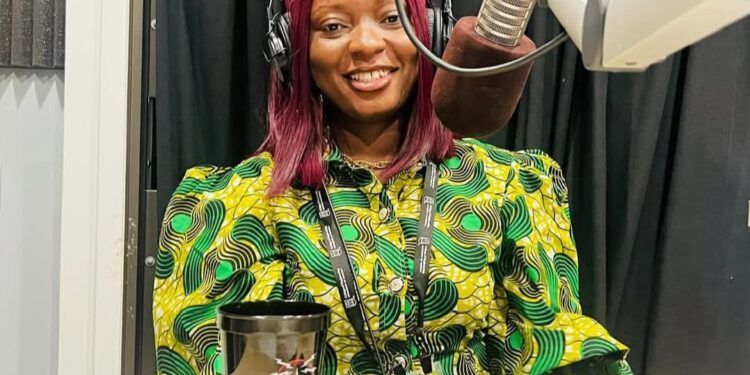 ActionAid Liberia Program Coordinator Norwu Harris speaks on climate justice during a radio interview ahead of a grassroots dialogue in Bong County