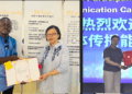 The Liberian Investigator journalists Blamo N. Toe and Nyantee S. Togba receive appointment certificates as overseas correspondents for Changsha Evening News in China.