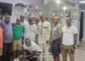 Sen. Saah Joseph with members of the Liberian community at Hands-On and Barber Business Center in Brooklyn Park, Minnesota.