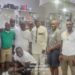 Sen. Saah Joseph with members of the Liberian community at Hands-On and Barber Business Center in Brooklyn Park, Minnesota.