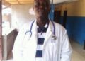 Man in white medical coat with stethoscope accused of posing as a doctor in Liberia murder indictment case