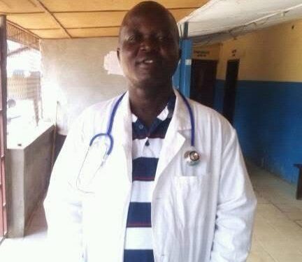 Man in white medical coat with stethoscope accused of posing as a doctor in Liberia murder indictment case
