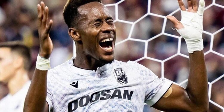 Liberian midfielder Sampson Dweh celebrates after providing an assist for Viktoria Plzen in a UEFA Champions League qualifying match.