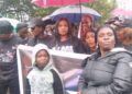 WONGOSOL Executive Director Esther Davis Yango and citizens protest at the Capitol, calling for stronger action against drug trafficking in Liberia.