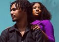 Isaac and Sianeh Warrak pose together in a confident, stylish photo, symbolizing their strong romantic and business partnership as a Liberian power couple.