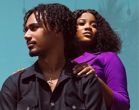 Isaac and Sianeh Warrak pose together in a confident, stylish photo, symbolizing their strong romantic and business partnership as a Liberian power couple.