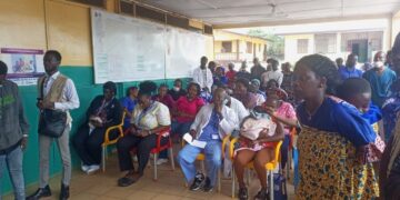 Patients and healthcare workers gathered at CB Dunbar Hospital in Bong County during the launch of a cost-sharing drug program aimed at improving medical supply availability.