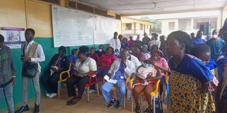 Patients and healthcare workers gathered at CB Dunbar Hospital in Bong County during the launch of a cost-sharing drug program aimed at improving medical supply availability.