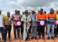 Officials including ArcelorMittal representatives and lawmakers dedicate newly rehabilitated Firestone–Kakata road in Margibi County, Liberia