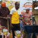 Billionaire Drap Tap Foundation outreach team handing supplies to community members in Grand Bassa County