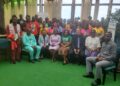 Group photo of government officials, development partners, and adolescent leaders at the Adolescent Girls Conference in Monrovia, Liberia