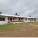 Renovated AFL barracks and nearby civilian homes in Kakata, Margibi County, at the center of a land reclamation dispute that has left dozens facing eviction.