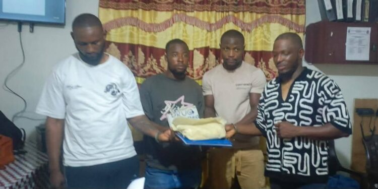LDEA officers display confiscated Methcathinone after arresting four men at Bo Waterside in Liberia.