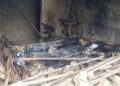 Burned remains of a house in Bong Mine where a one-month-old boy died in a fire later ruled accidental by a coroner’s jury.
