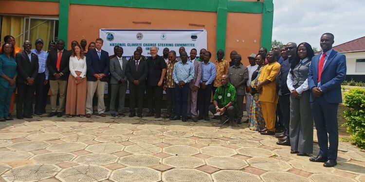 Group photo of Liberian government officials, lawmakers, and development partners at the national carbon policy dialogue in Ganta, Nimba County