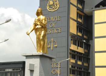 Golden statue of Lady Justice in front of Liberia’s Temple of Justice, where the Judiciary will launch a weeklong personnel verification and credential audit.