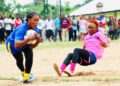 Liberian female kickball players in action during an exhibition match as Sierra Leone endorses the sport.