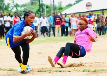 Liberian female kickball players in action during an exhibition match as Sierra Leone endorses the sport.