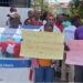 Transport Ministry staff protest in Monrovia holding placards against the Liberia Traffic Management Incorporated concession deal