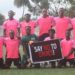 Liberia football team holding a “Say No to Drugs” sign before a match, promoting LFA’s upcoming mandatory drug testing policy