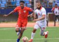 Liberia and Tunisia players contest the ball during a 2026 World Cup qualifier in Monastir